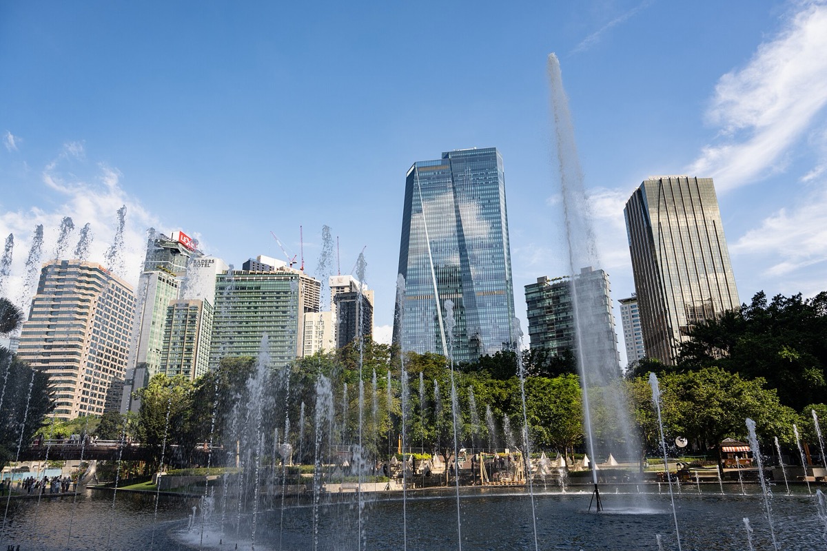 KLCC Park fountains on a clear day, Kuala Lumpur